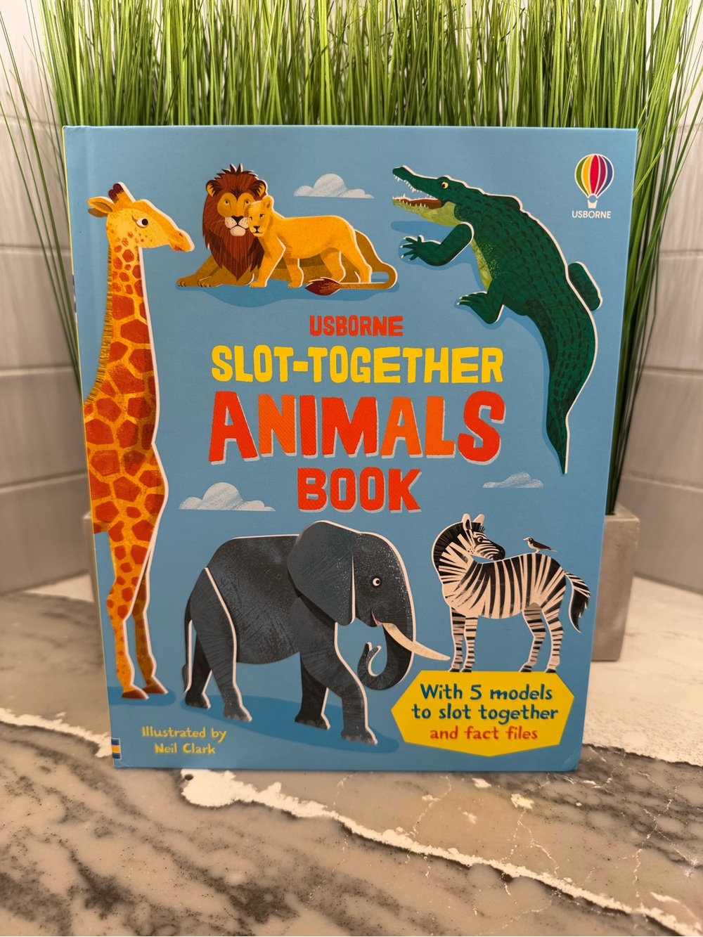 Usborne slot together animals book